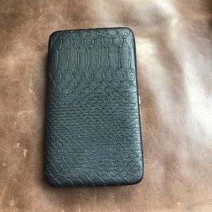 Black snakeskin clutch